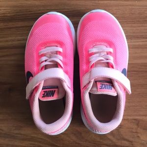 Girl hot pink Nikes